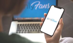onlyfans logo phone and computer