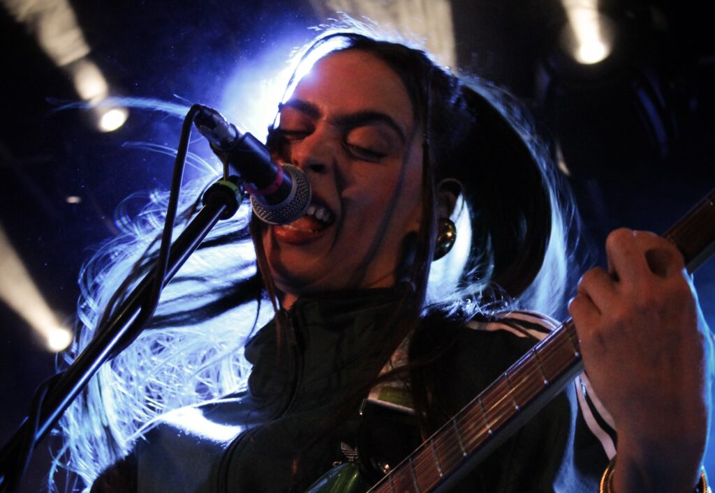 Lead singer of Hinds, Ana García Perrote, performing at The Brudenell Social Club.