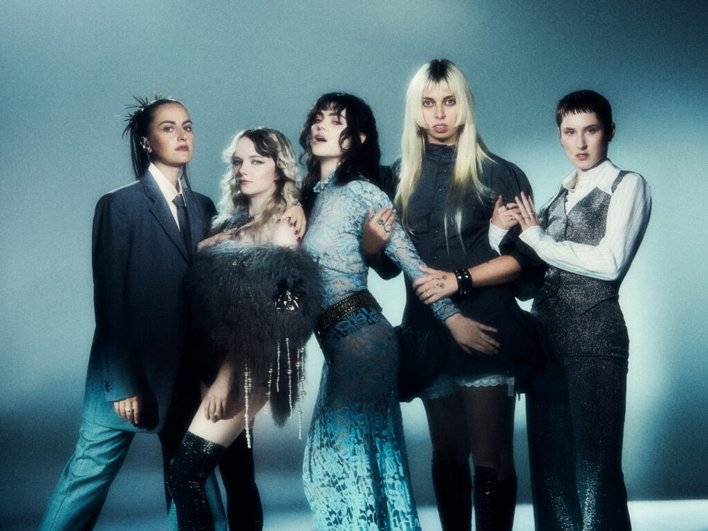 Members of The Last Dinner Party pose for artwork for their latest album