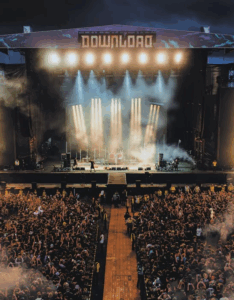 Picture of large stage at Download festival with full crowd.