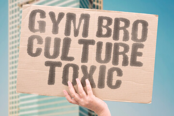 cardboard sign saying "gym bro culture toxic"