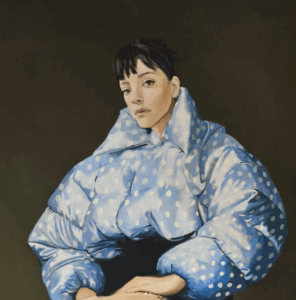 Album cover for Lily Allen's 2025 album 'West End Girl'. It features a painting in traditional portraiture style of Lily Allen against a dark background wearing a big shiny blue puffer jacket with white polka dots. She is staring straight into the camera, with a serious or pensive expression on her face.
