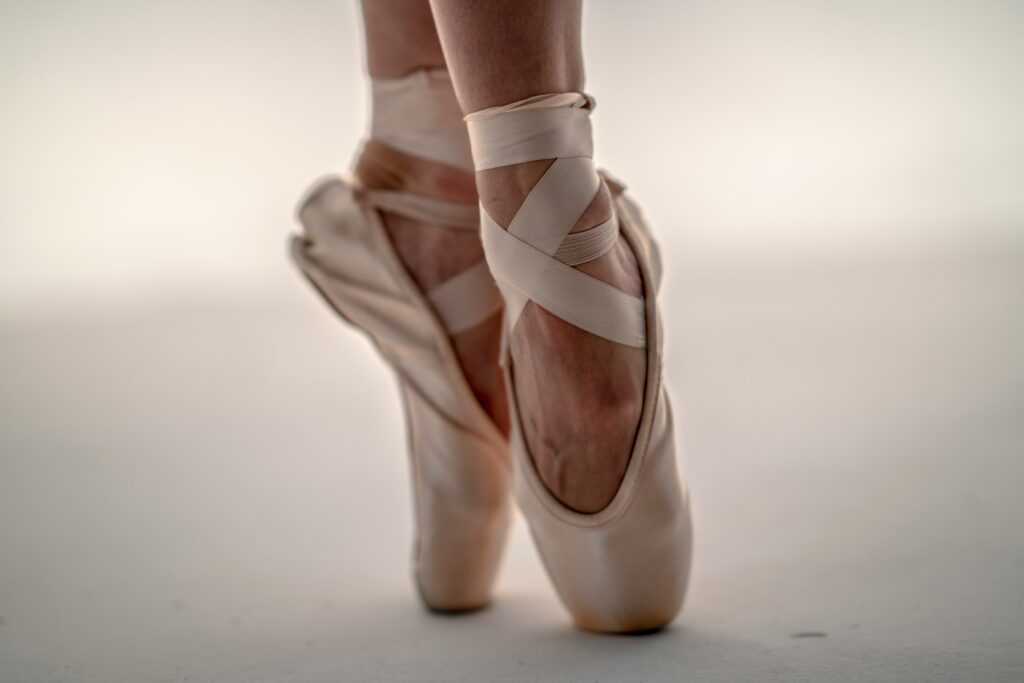 Pink ballet shoes on pointe