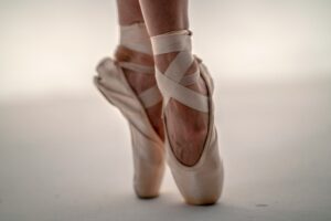 Pink ballet shoes on pointe