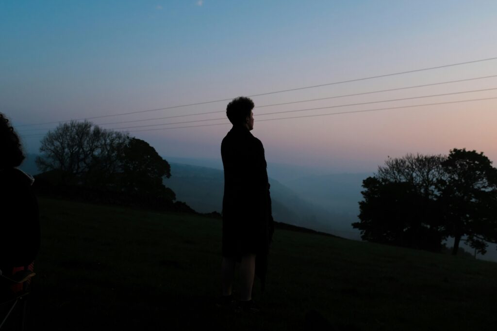 Person standing alone in Hebden Bridge