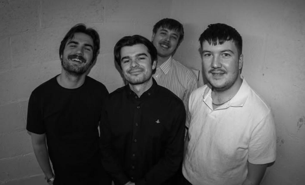 Sheffield band Cruz pose backstage for a picture